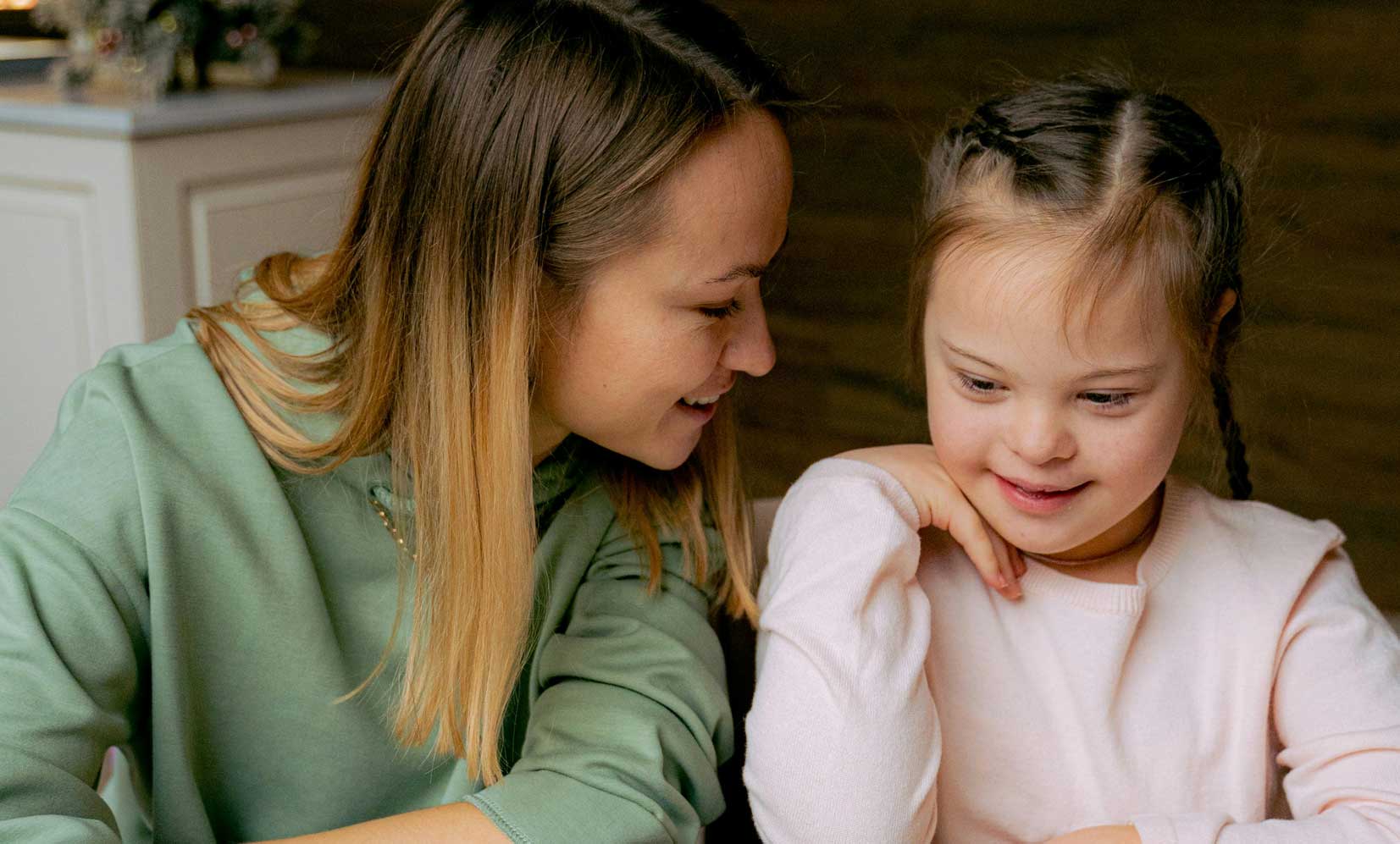 Mother and child exploring pediatric therapy resources